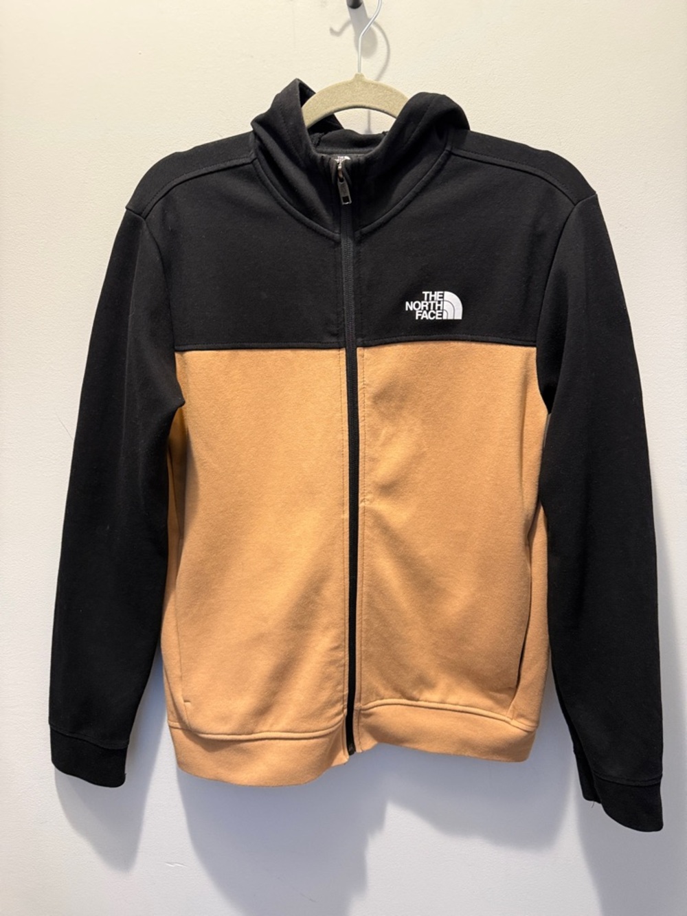 The North Face zip up hoodie in size 14-16